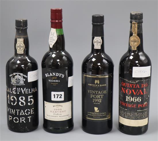 Three bottles of port including 1985 Real Velha 1985, Quinta do Noval 1966 and Fortnum and masons 1992 and a bottle of Blandys Harves